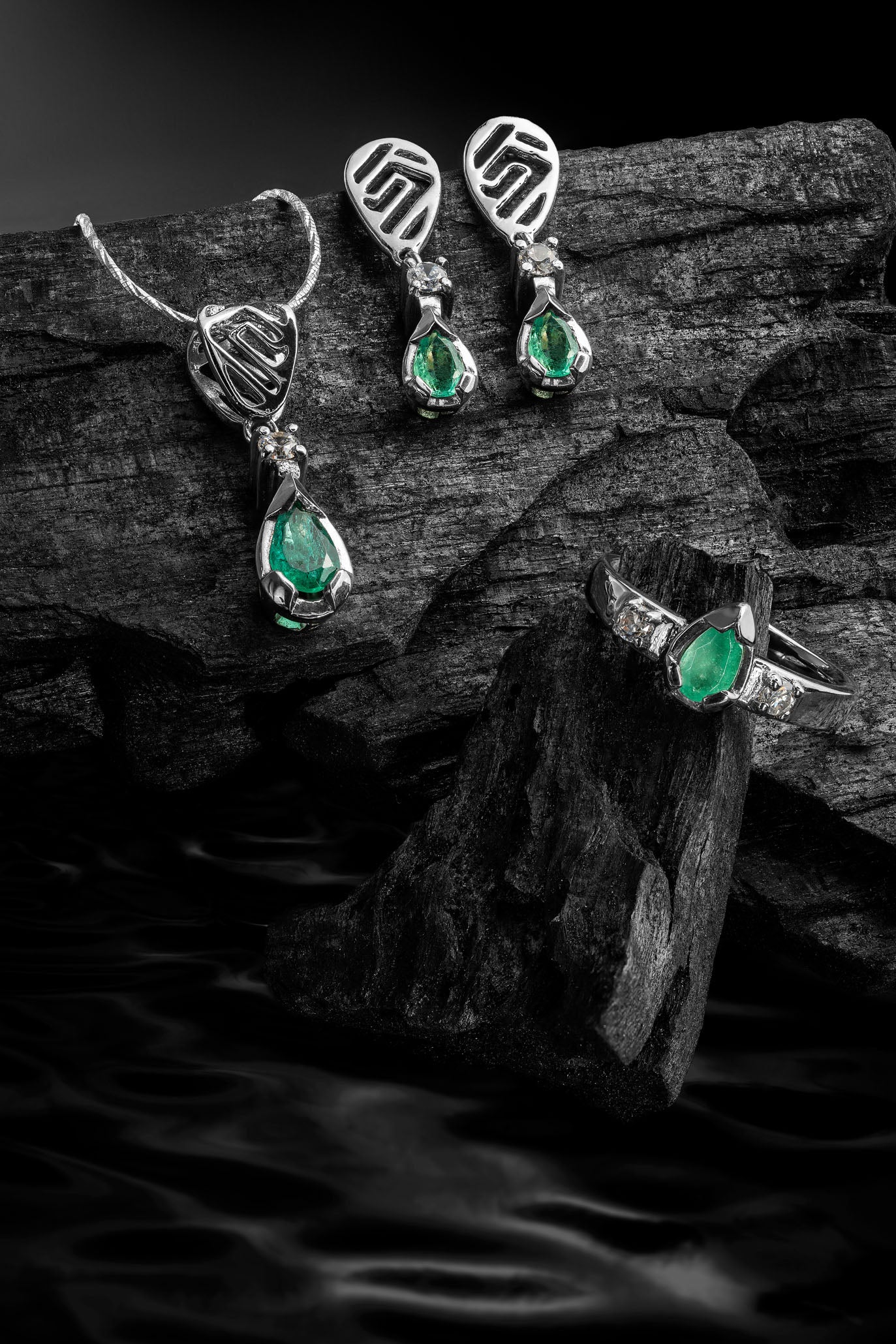 The Whisper of the Eagle Colombian Emerald Earrings in 0.38 ct Sterling Silver