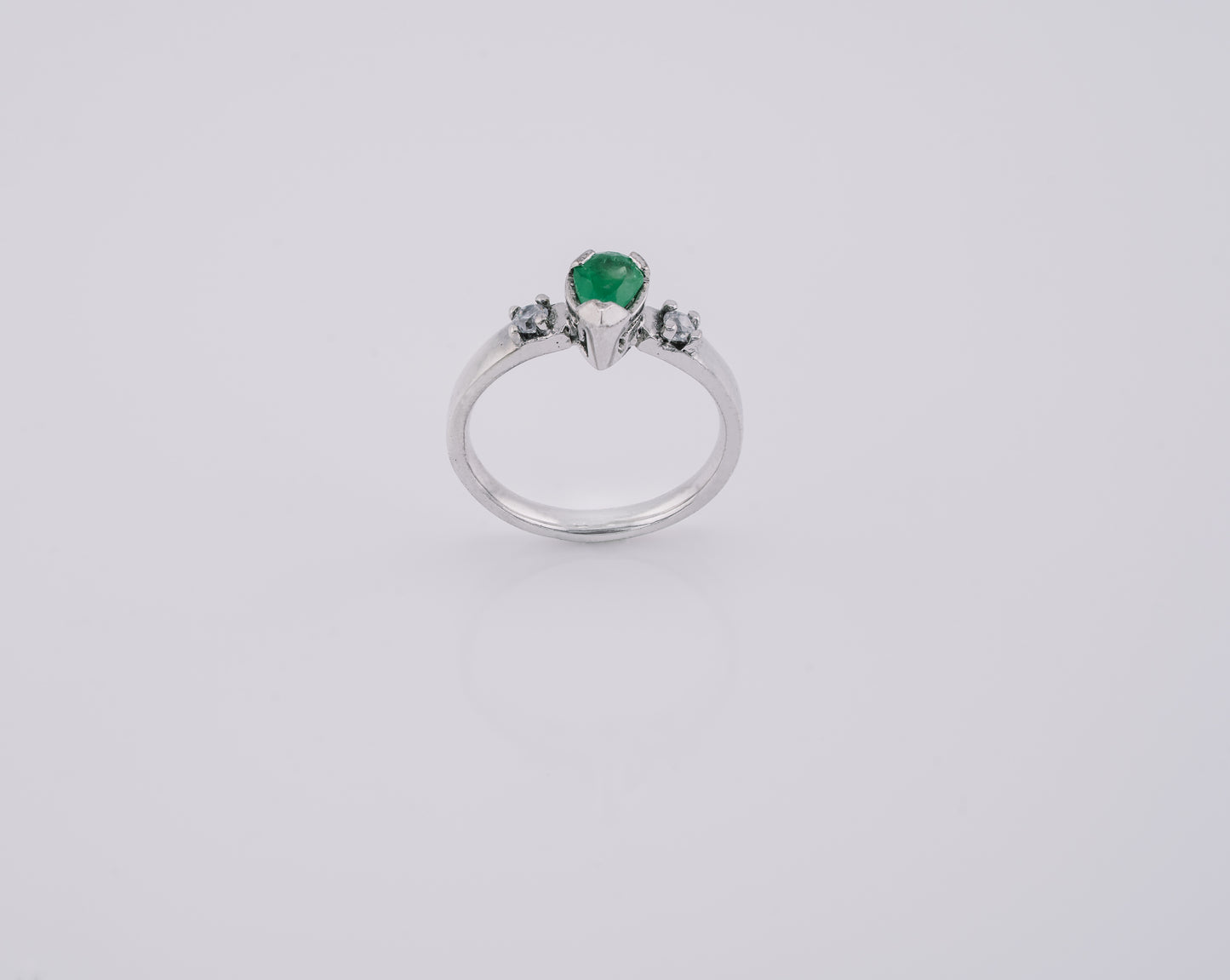The Echo of Rebirth Colombian Emerald Ring in 0.53 ct Sterling Silver