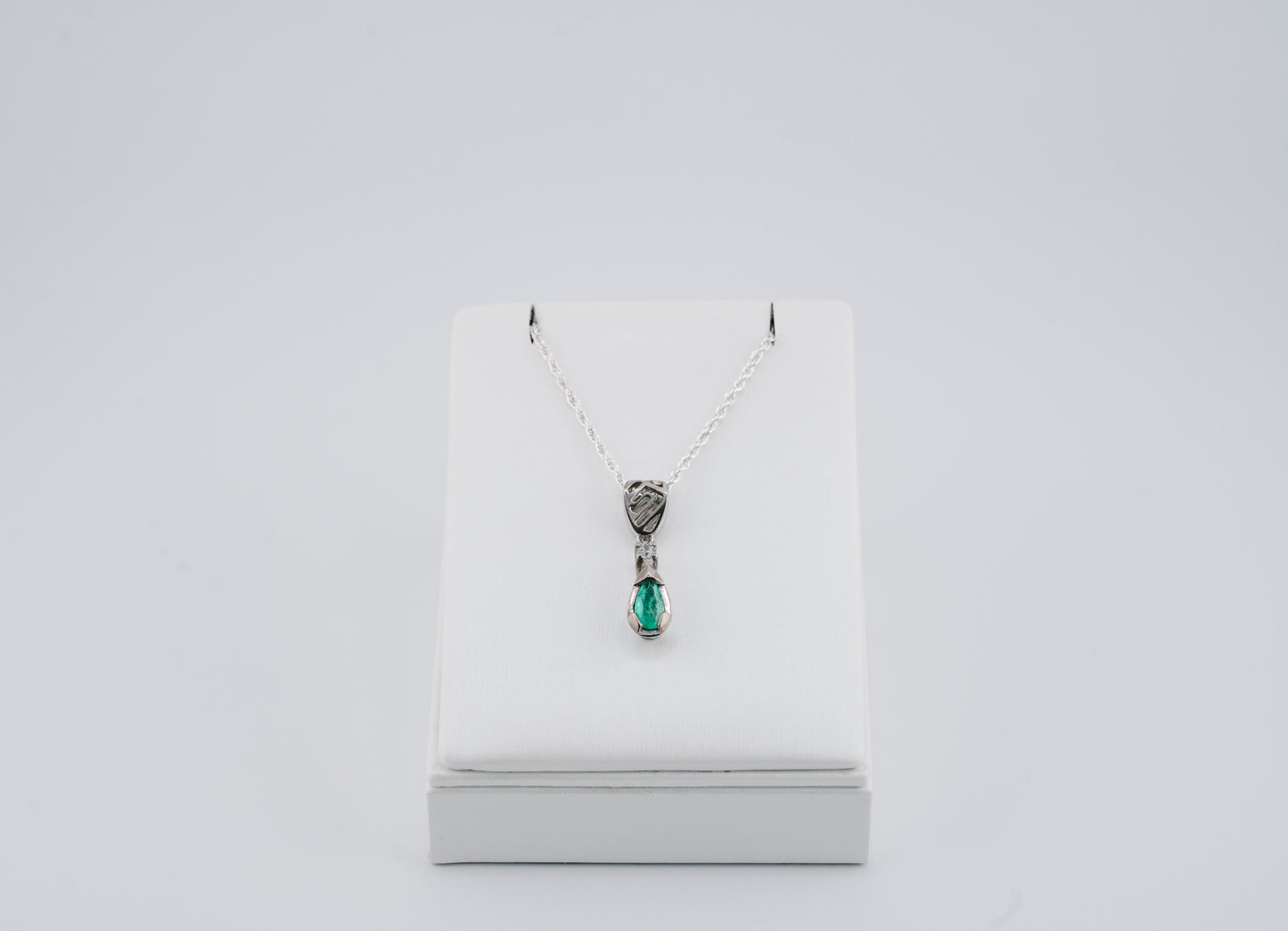 The Heart of the Guardian Pendant – 0.39 Colombian Emerald – 950 Sterling Silver