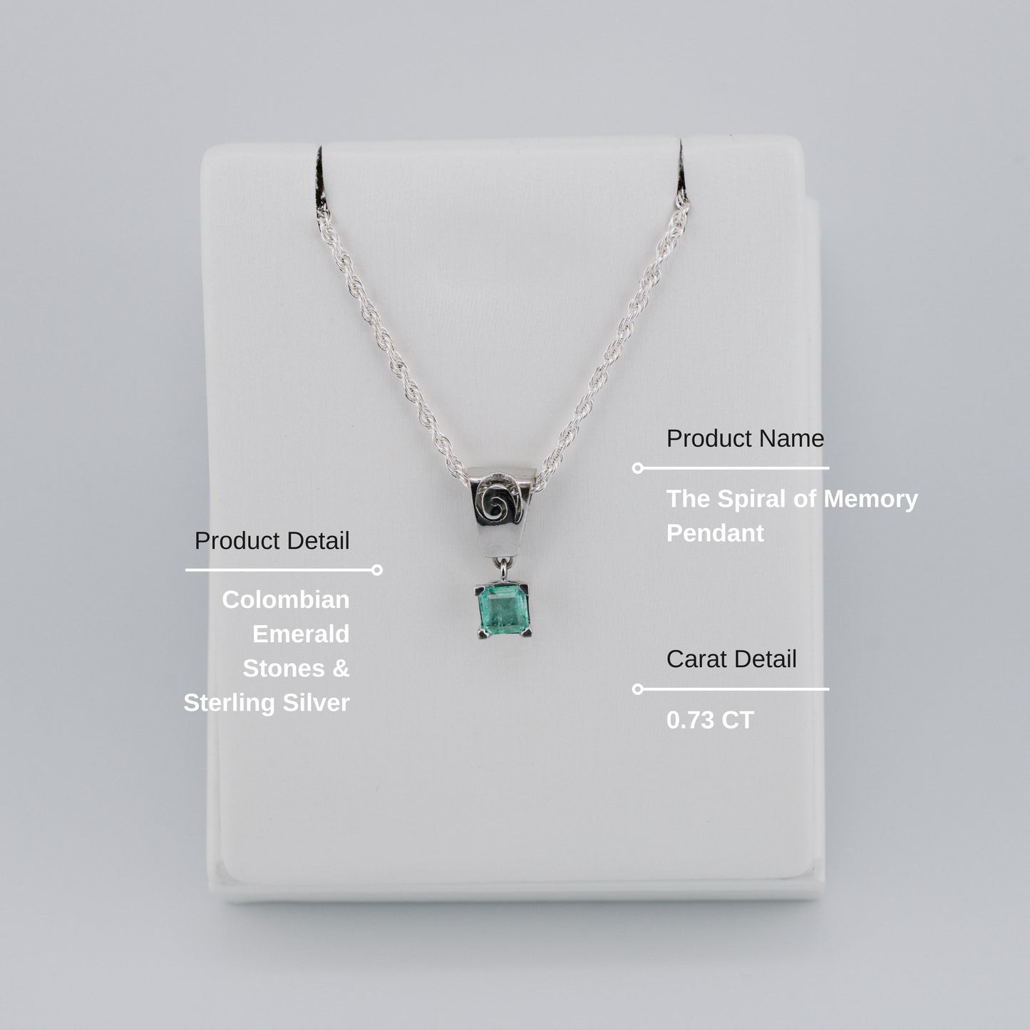 The Spiral of Memory Pendant – 0.73 Colombian Emerald – 950 Sterling Silver