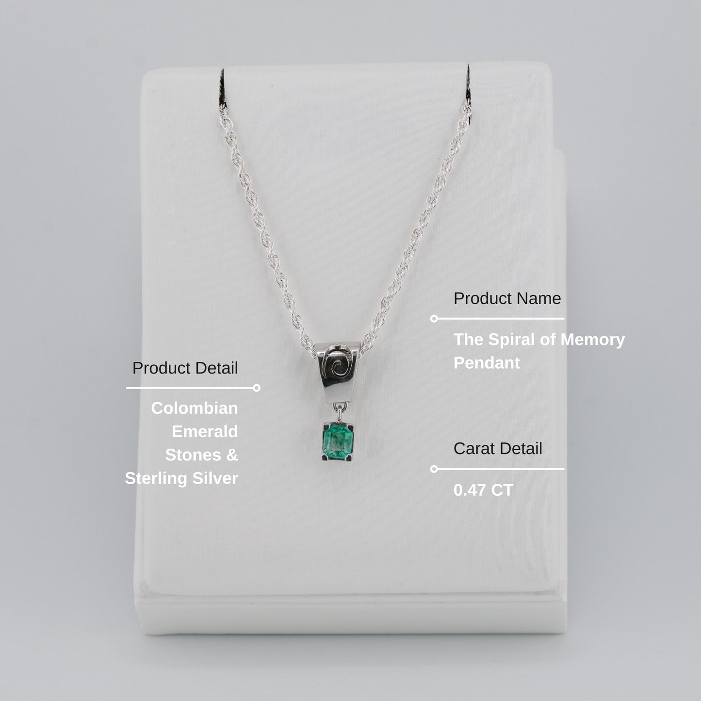 The Spiral of Memory Pendant – 0.47 Colombian Emerald – 950 Sterling Silver