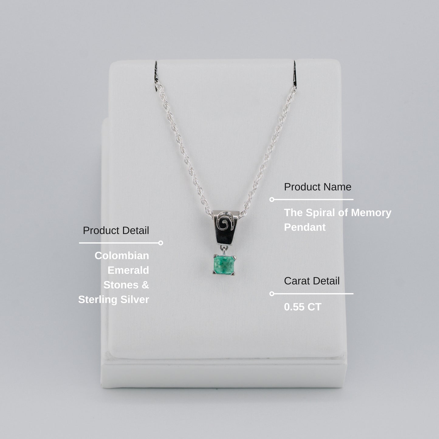 The Spiral of Memory Pendant – 0.55 Colombian Emerald – 950 Sterling Silver