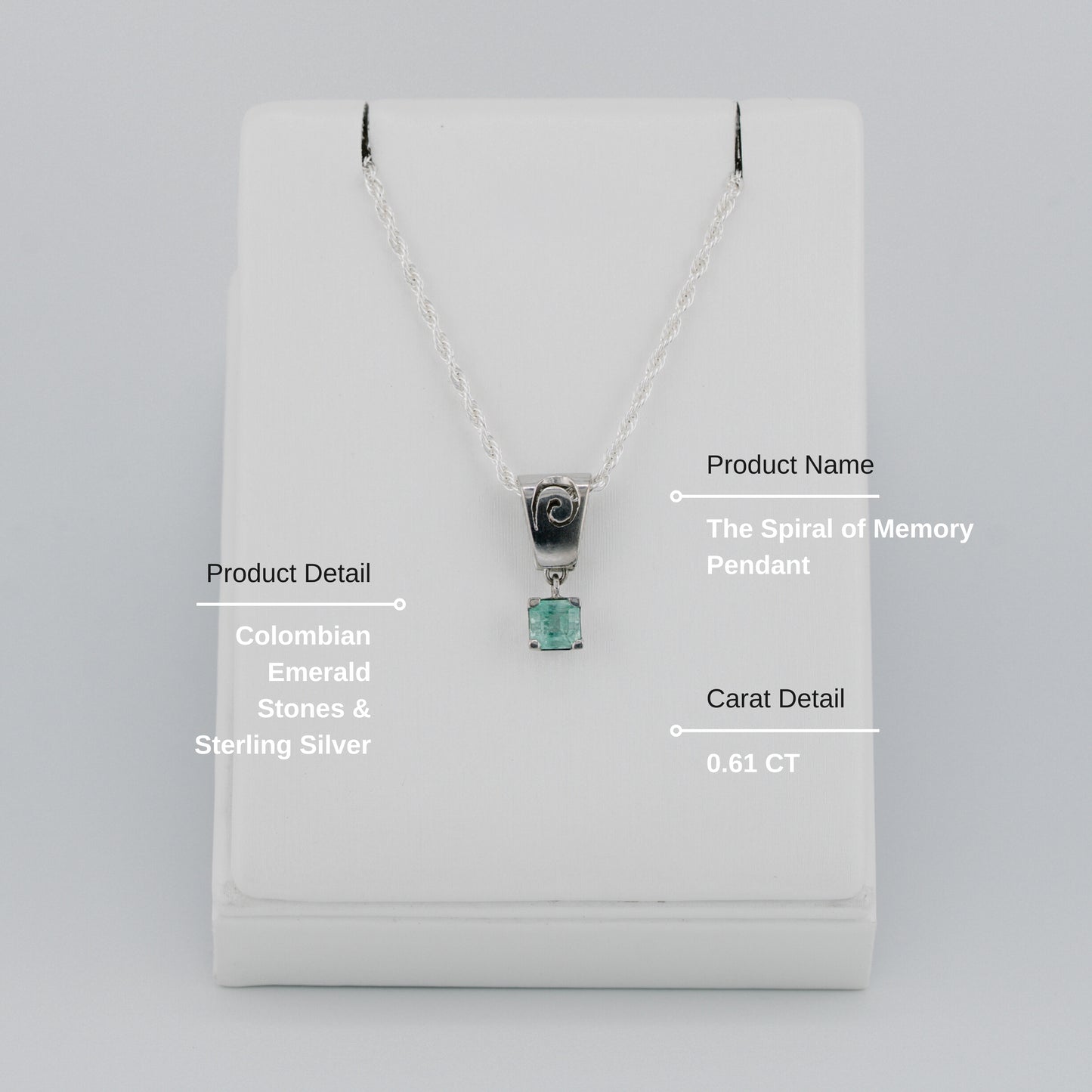 The Spiral of Memory Pendant – 0.61 Colombian Emerald – 950 Sterling Silver