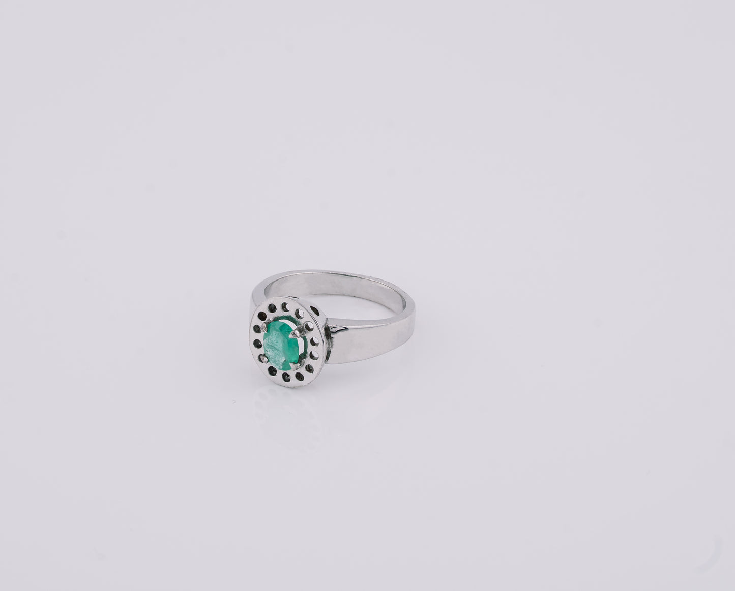 The Circle of the Ancients Colombian Emerald Ring in 0.43 ct Sterling Silver
