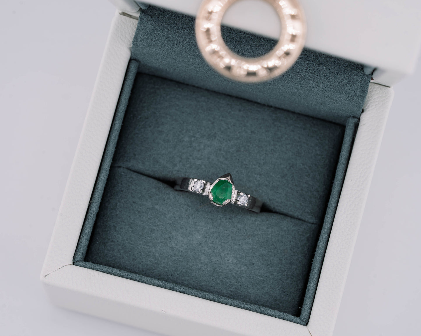 The Echo of Rebirth Colombian Emerald Ring in 0.55 ct Sterling Silver