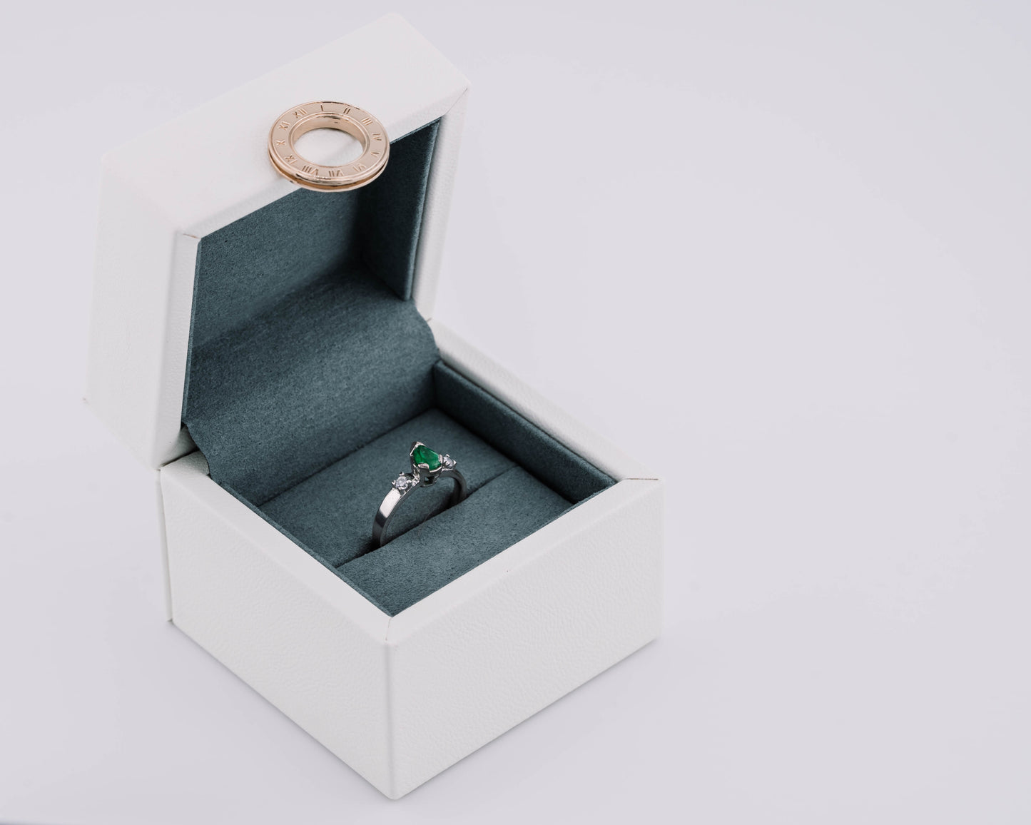 The Echo of Rebirth Colombian Emerald Ring in 0.55 ct Sterling Silver
