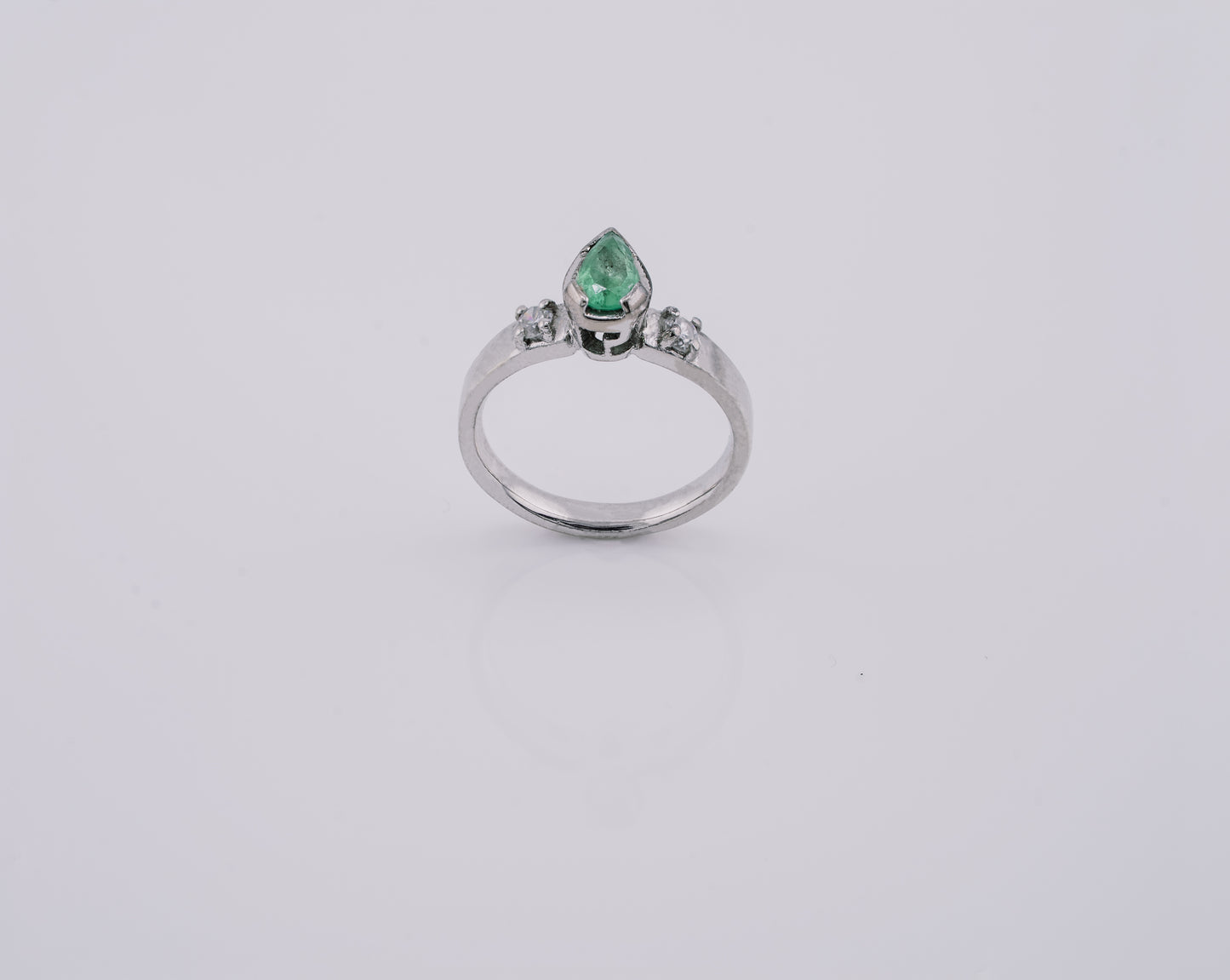 The Echo of Rebirth Colombian Emerald Ring in 0.55 ct Sterling Silver