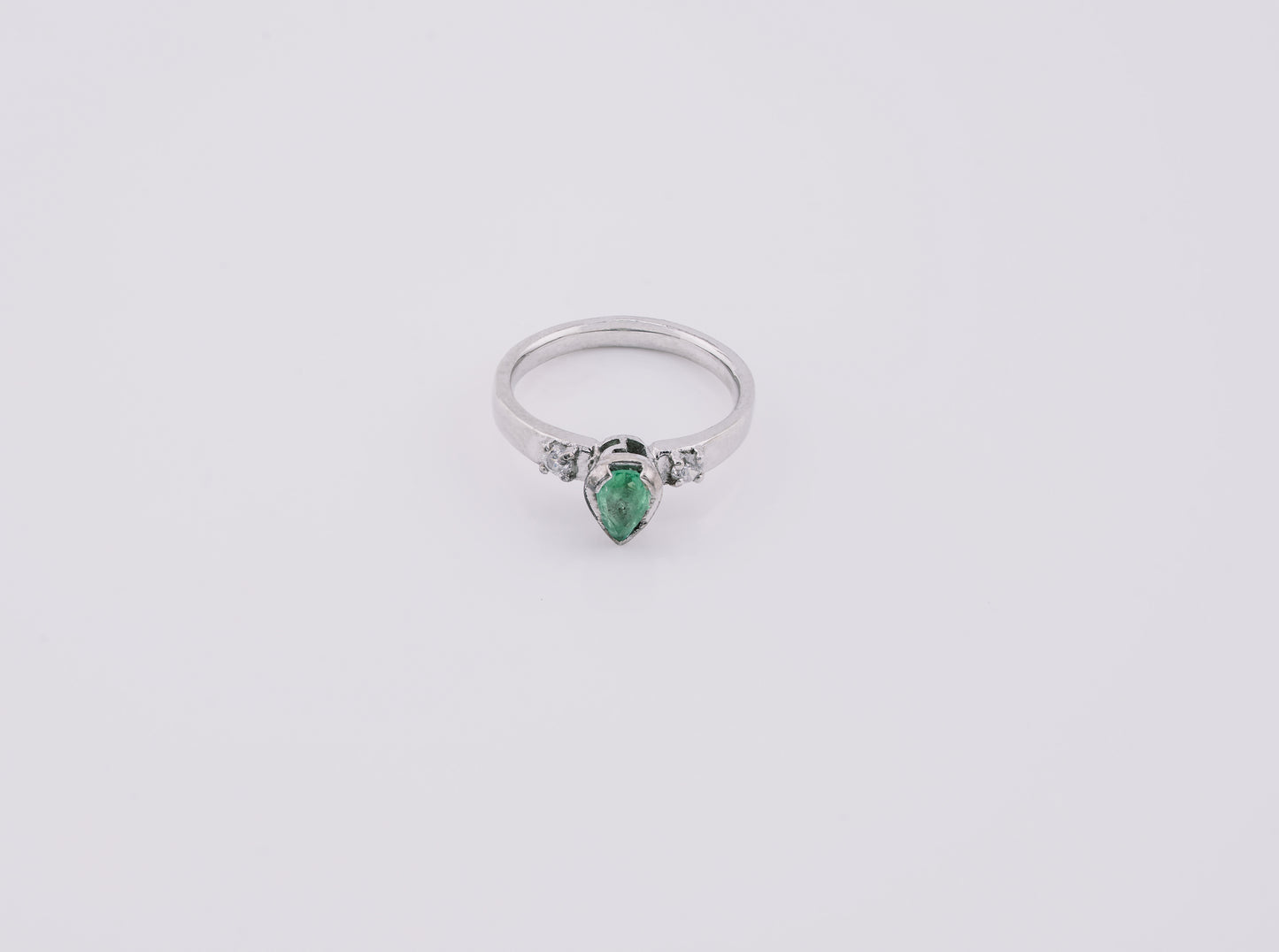 The Echo of Rebirth Colombian Emerald Ring in 0.55 ct Sterling Silver