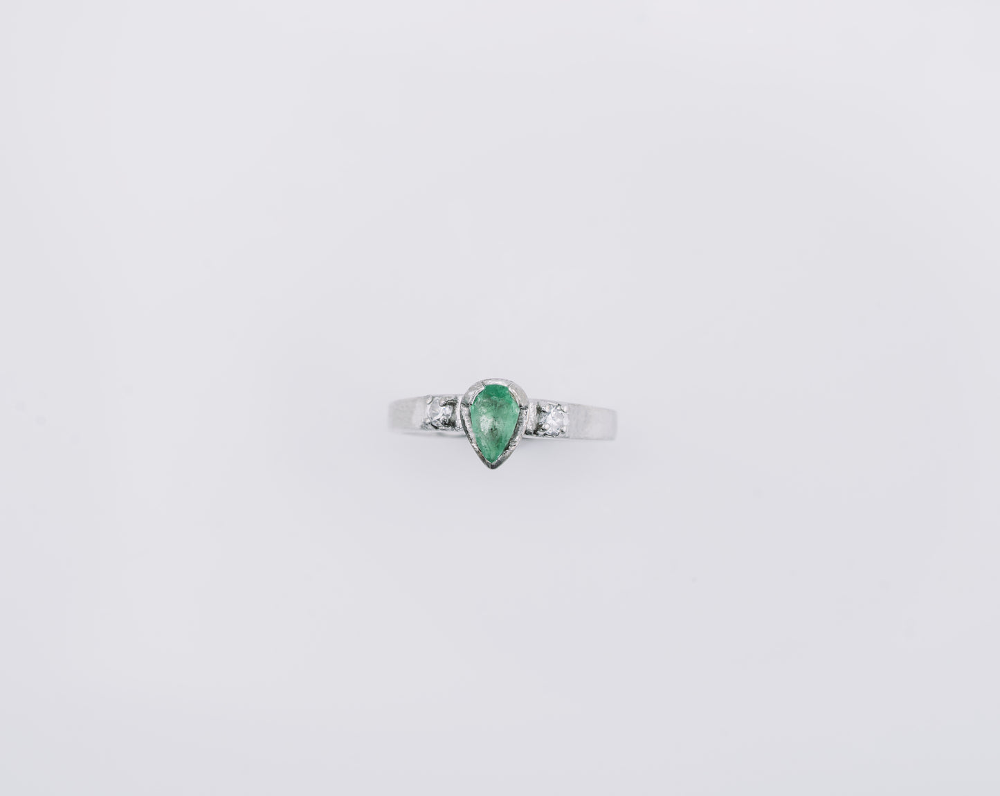 The Echo of Rebirth Colombian Emerald Ring in 0.55 ct Sterling Silver
