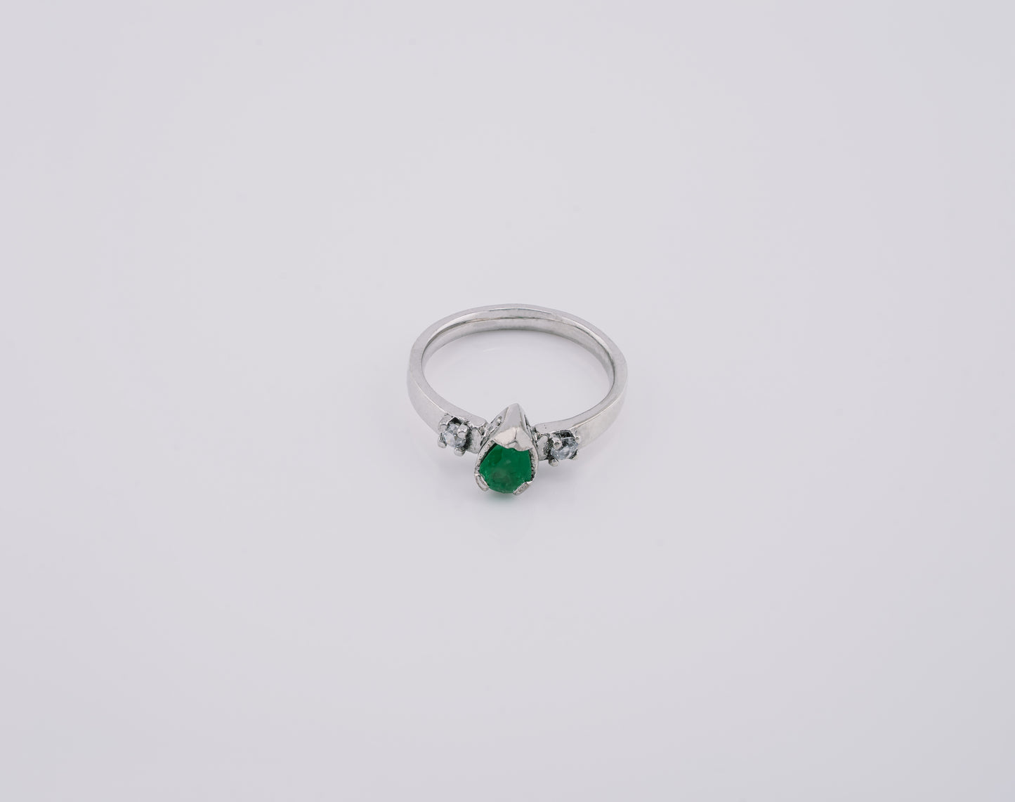 The Echo of Rebirth Colombian Emerald Ring in 0.53 ct Sterling Silver