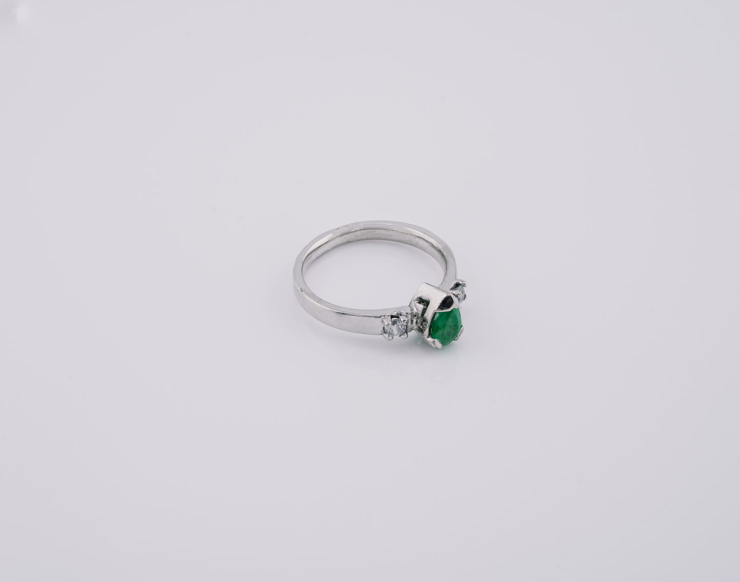 The Echo of Rebirth Colombian Emerald Ring in 0.53 ct Sterling Silver
