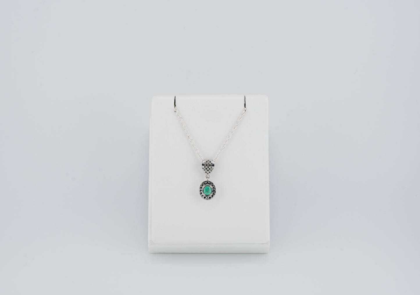 The Offering of Light Pendant – 0.40 Colombian Emerald – 950 Sterling Silver