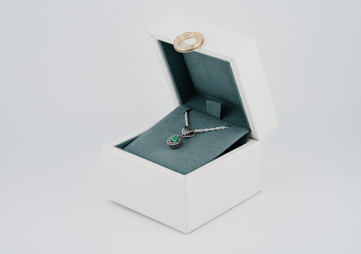 The Offering of Light Pendant – 0.40 Colombian Emerald – 950 Sterling Silver