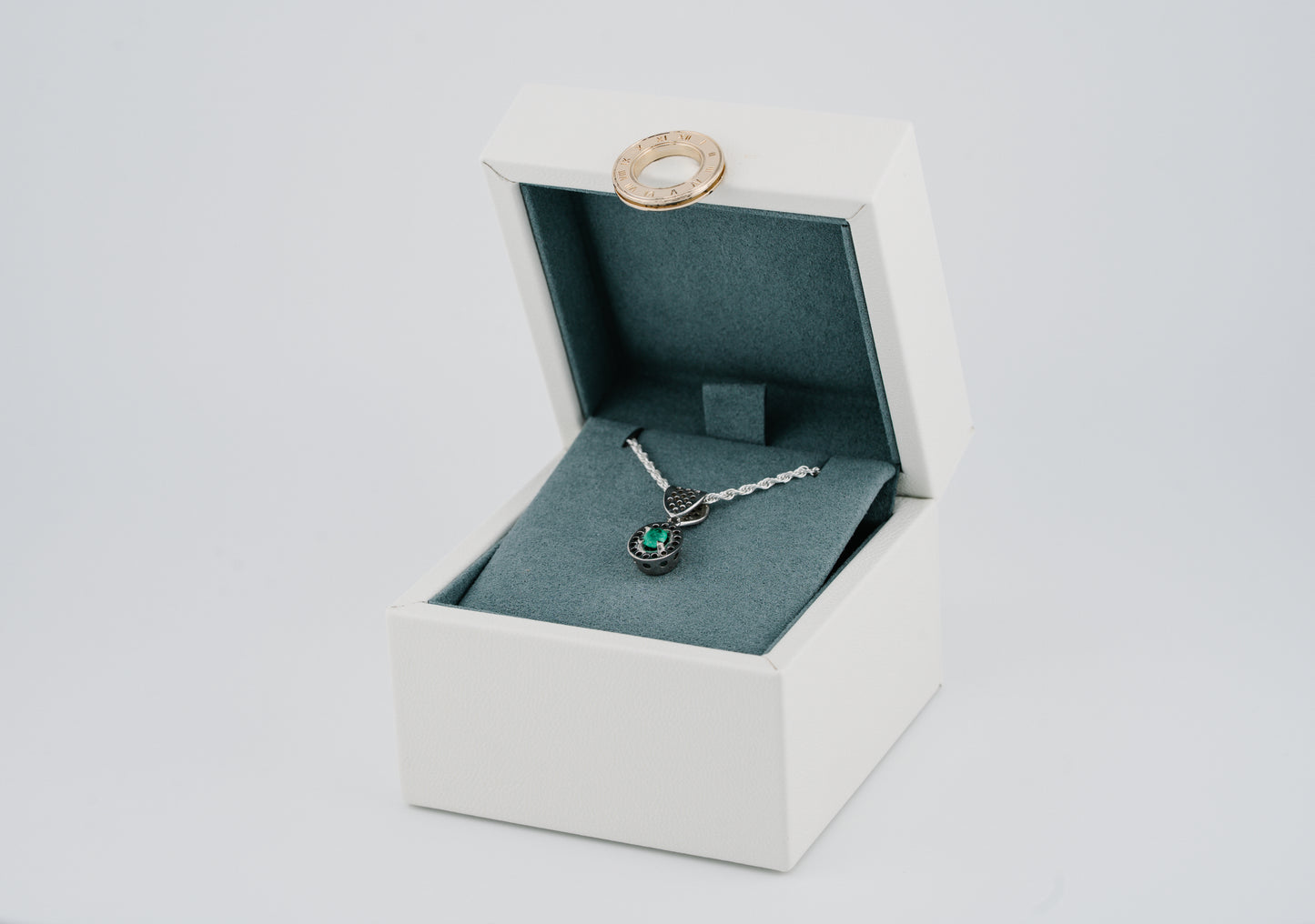 The Offering of Light Pendant – 0.40 Colombian Emerald – 950 Sterling Silver