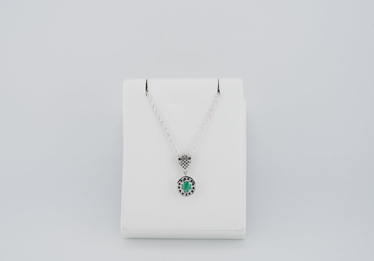 The Offering of Light Pendant – 0.47 Colombian Emerald – 950 Sterling Silver