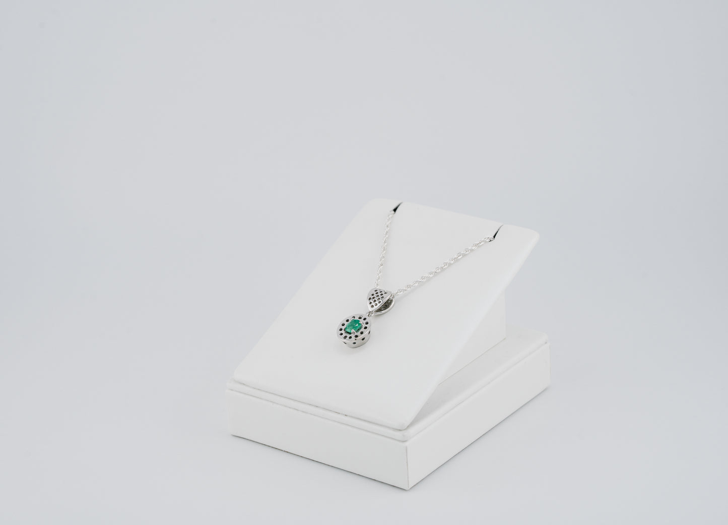 The Offering of Light Pendant – 0.47 Colombian Emerald – 950 Sterling Silver