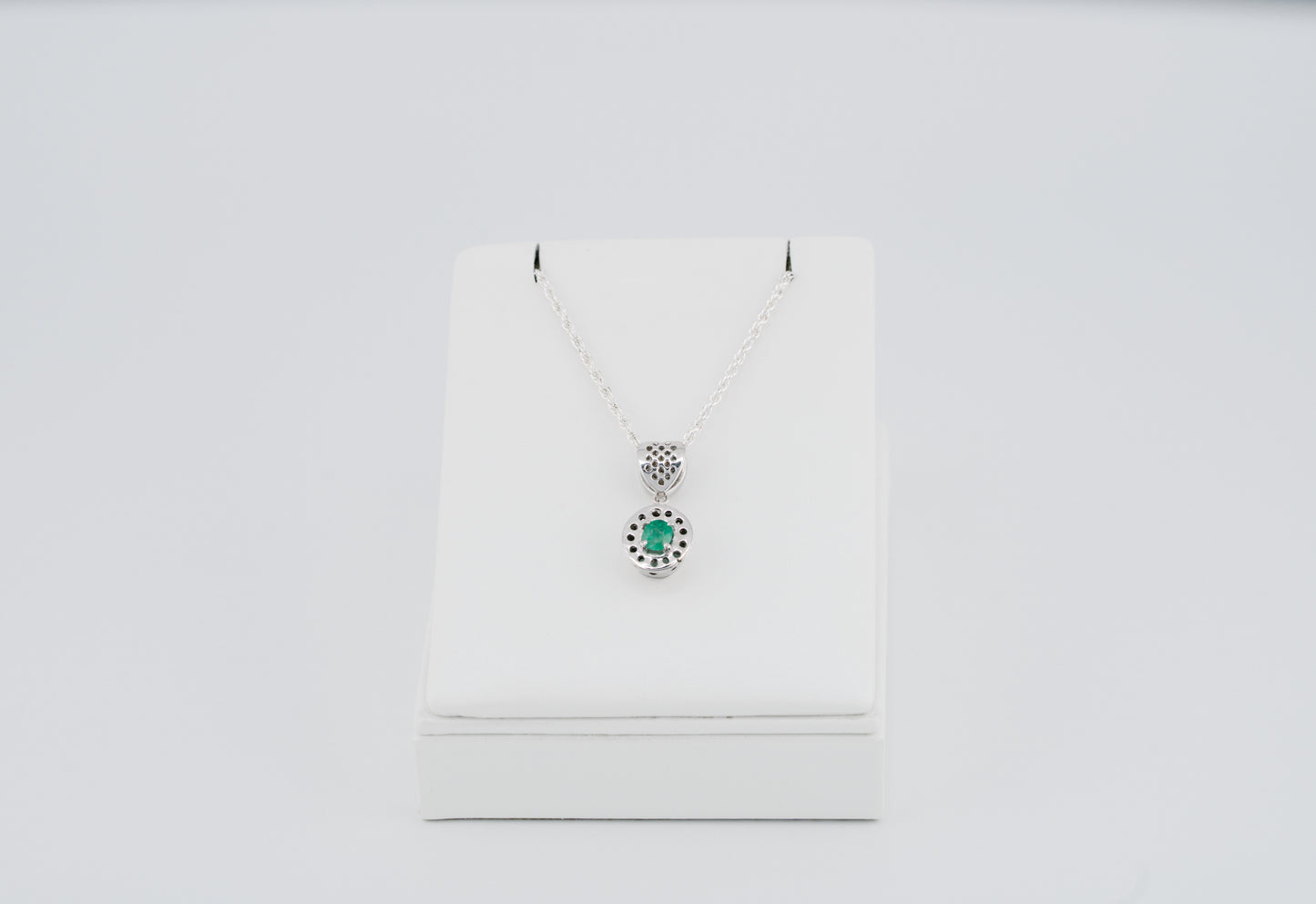 The Offering of Light Pendant – 0.47 Colombian Emerald – 950 Sterling Silver