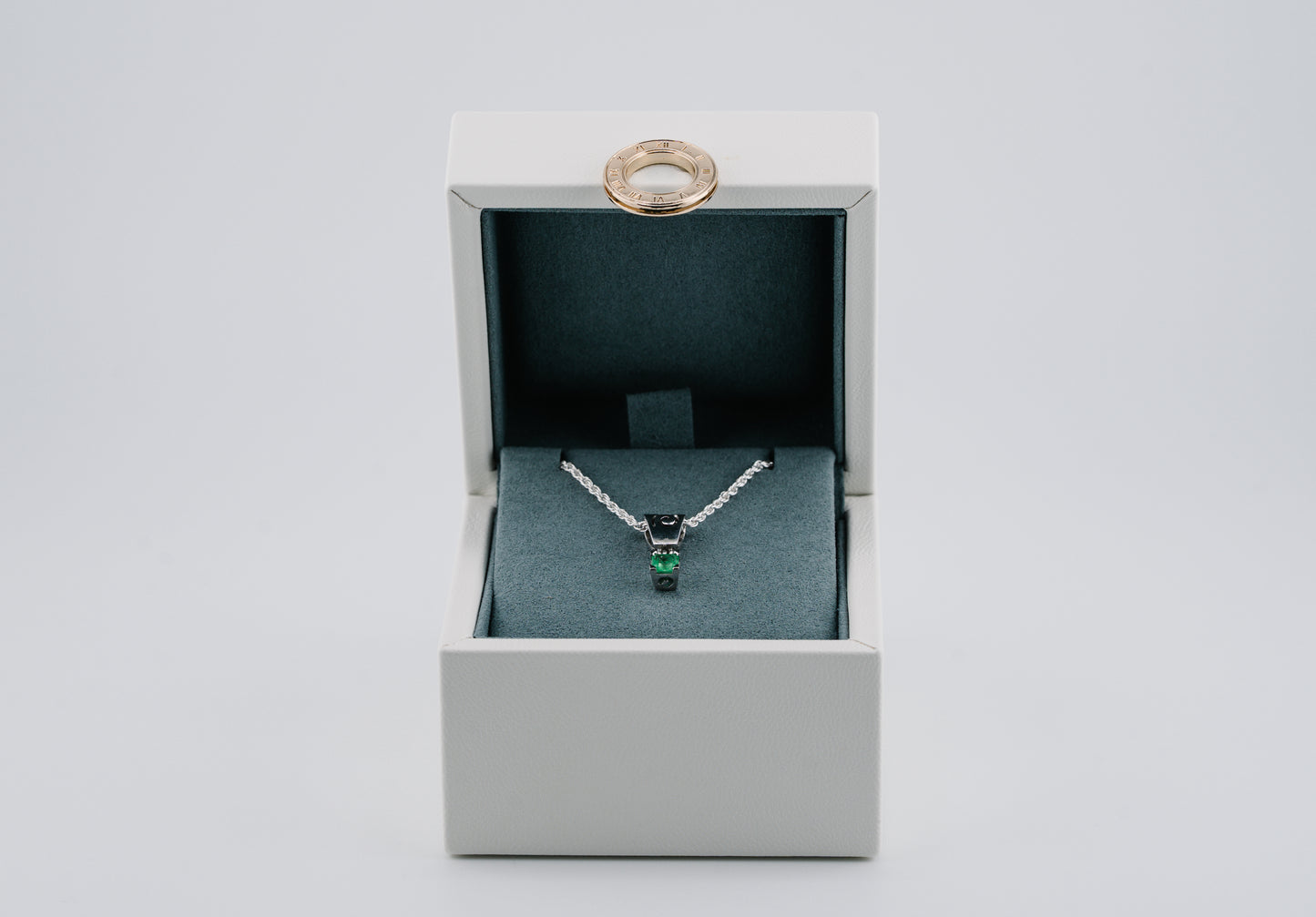 The Spiral of Memory Pendant – 0.74 Colombian Emerald – 950 Sterling Silver