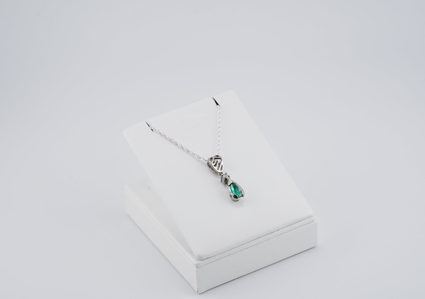 The Heart of the Guardian Pendant – 0.39 Colombian Emerald – 950 Sterling Silver