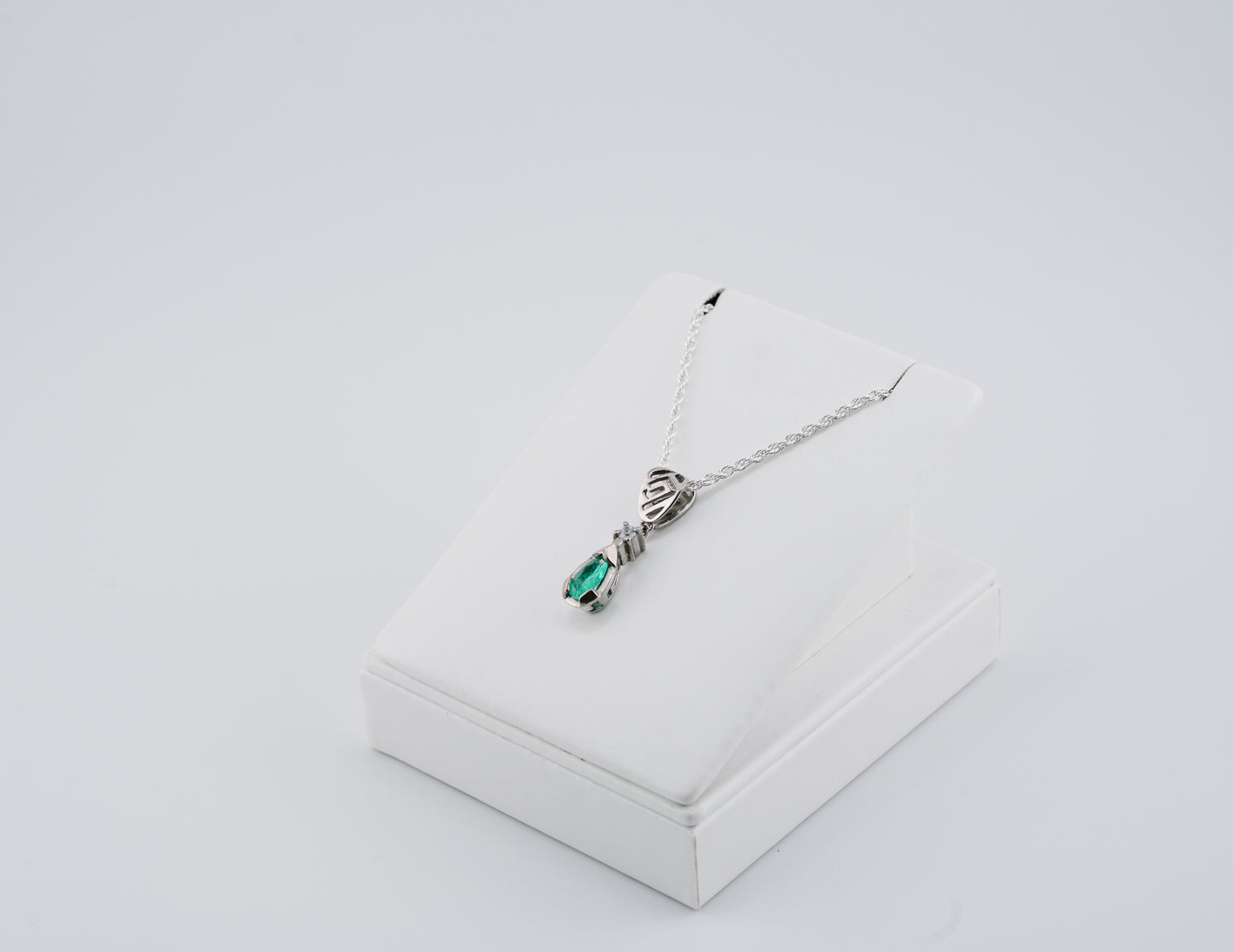The Heart of the Guardian Pendant – 0.39 Colombian Emerald – 950 Sterling Silver