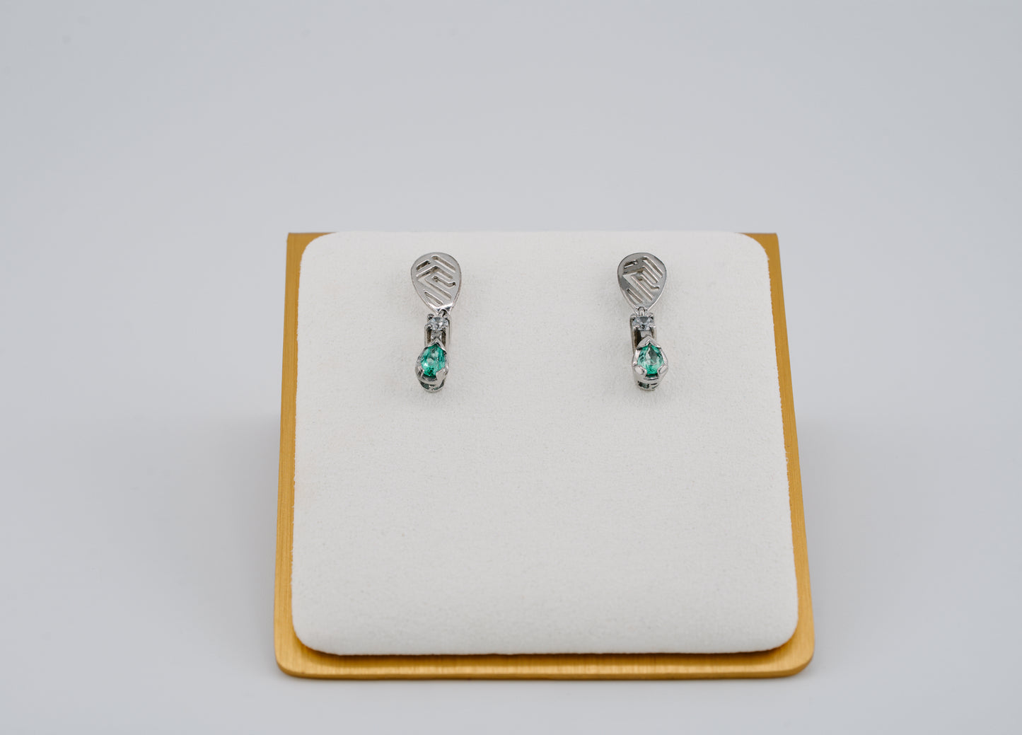The Whisper of the Eagle Colombian Emerald Earrings in 0.42 ct Sterling Silver