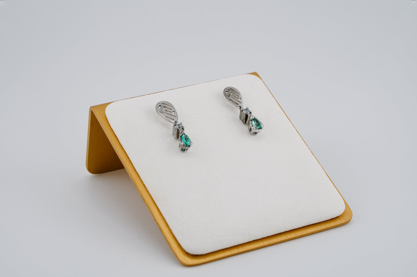 The Whisper of the Eagle Colombian Emerald Earrings in 0.42 ct Sterling Silver