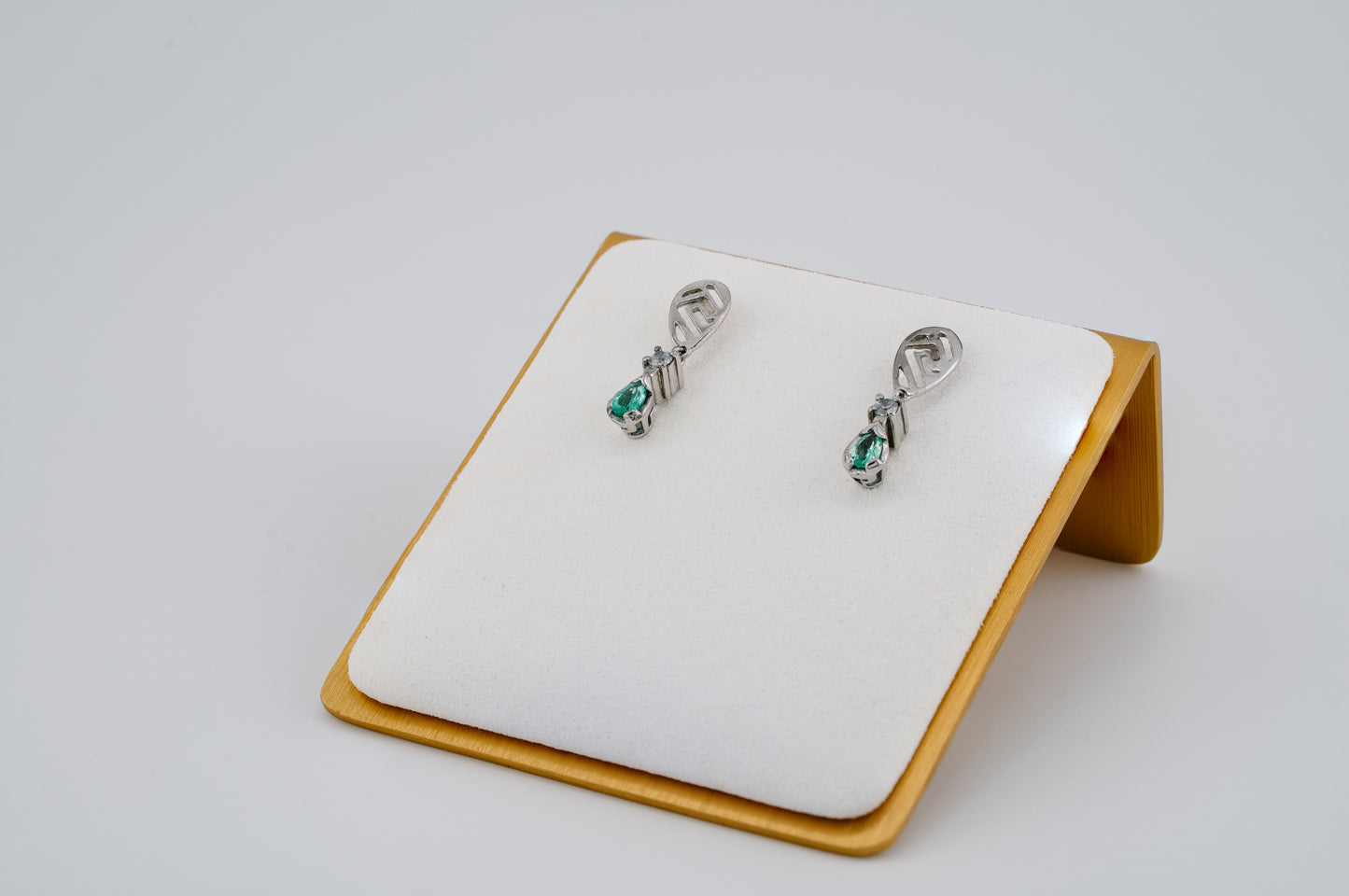 The Whisper of the Eagle Colombian Emerald Earrings in 0.42 ct Sterling Silver