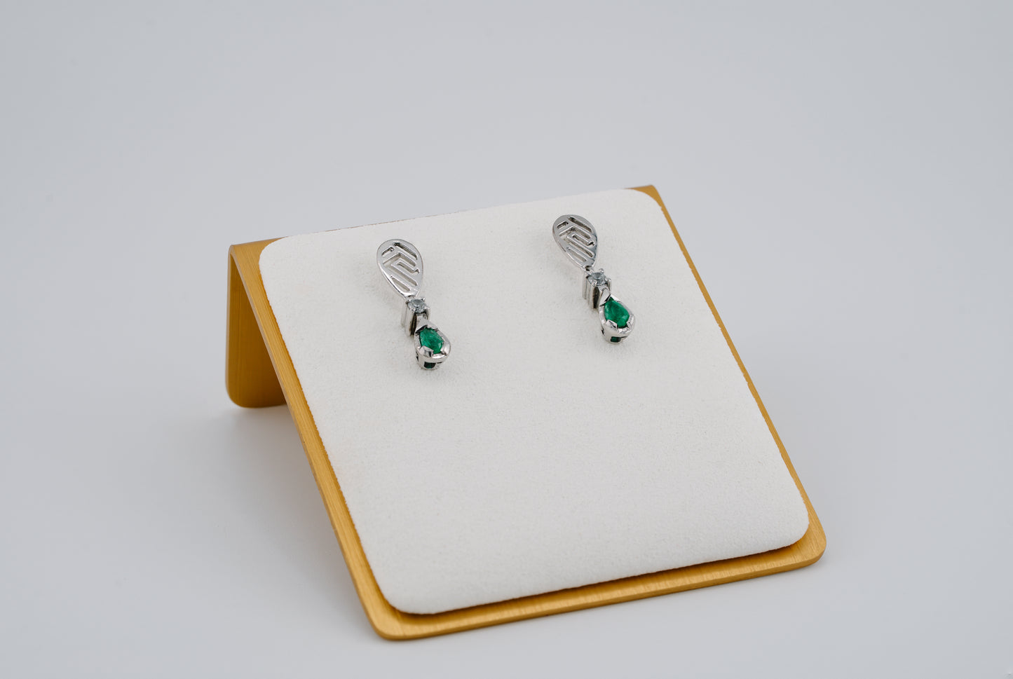 The Whisper of the Eagle Colombian Emerald Earrings in 0.38 ct Sterling Silver