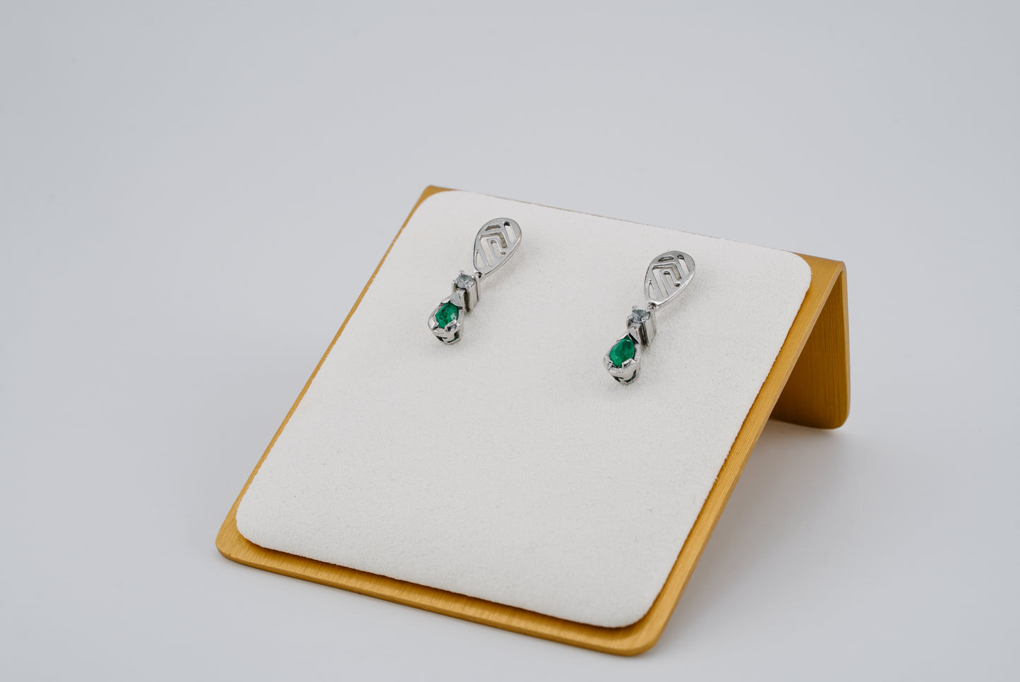 The Whisper of the Eagle Colombian Emerald Earrings in 0.38 ct Sterling Silver
