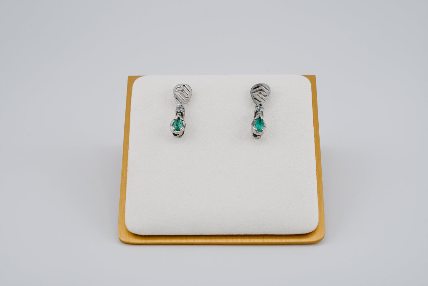 The Whisper of the Eagle Colombian Emerald Earrings in 0.27 ct Sterling Silver
