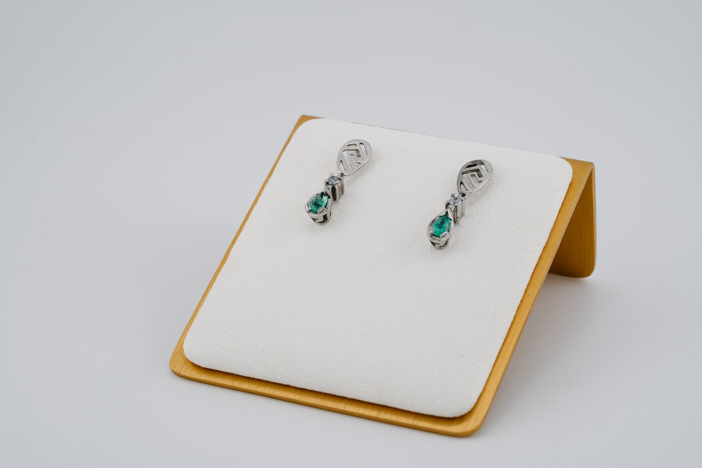 The Whisper of the Eagle Colombian Emerald Earrings in 0.27 ct Sterling Silver