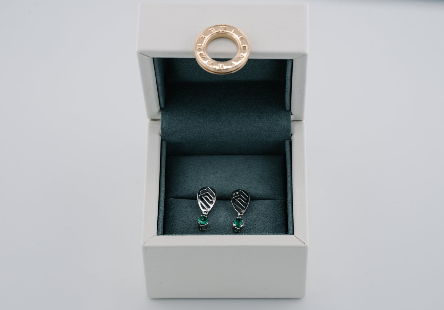 The Whisper of the Eagle Colombian Emerald Earrings in 0.27 ct Sterling Silver