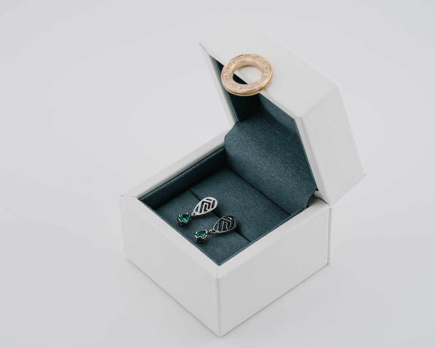 The Whisper of the Eagle Colombian Emerald Earrings in 0.27 ct Sterling Silver