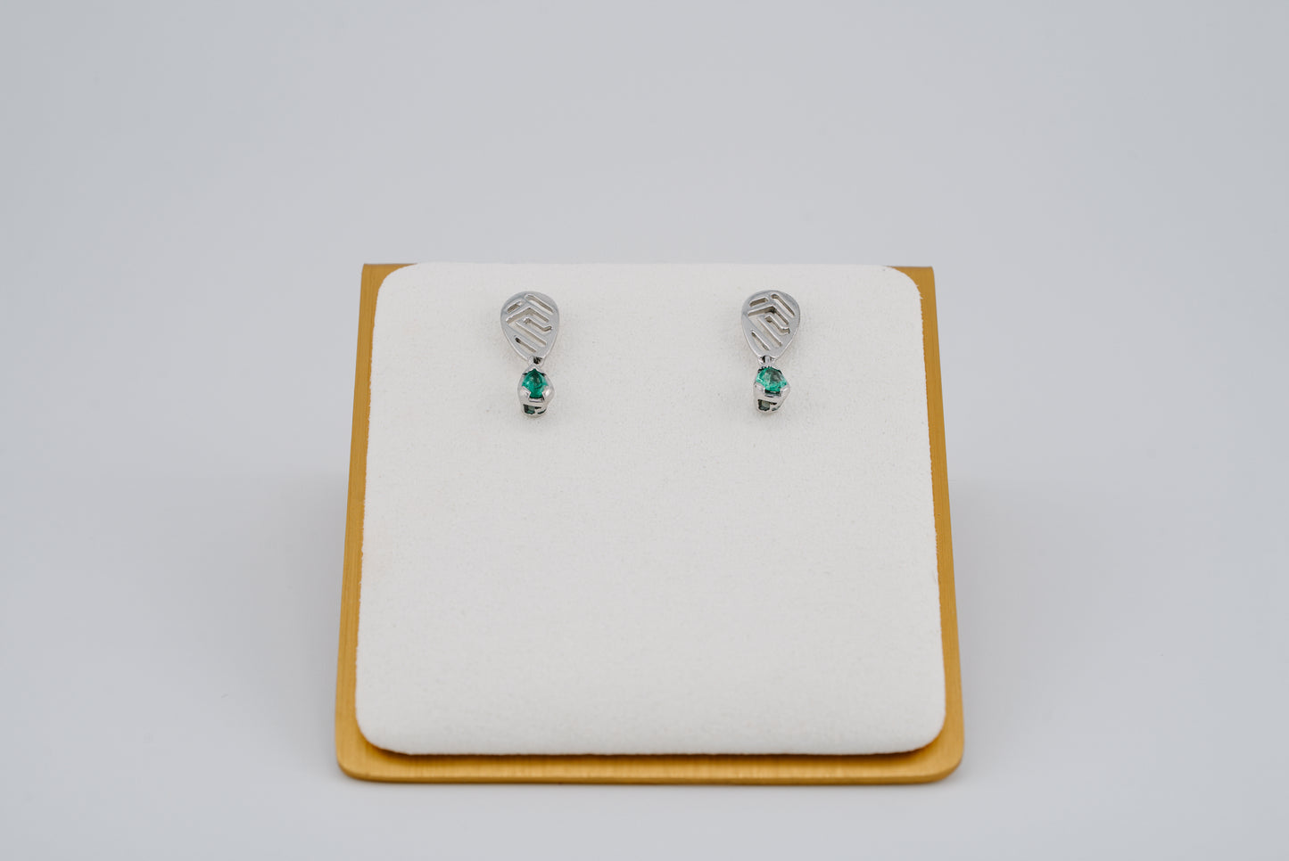 The Whisper of the Eagle Colombian Emerald Earrings in 0.27 ct Sterling Silver