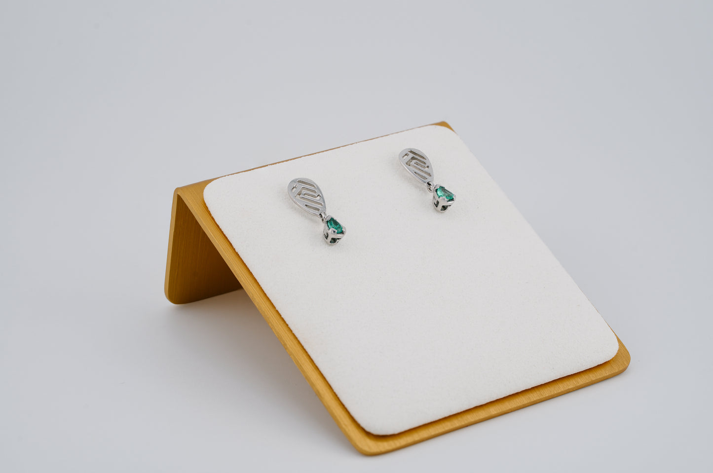 The Whisper of the Eagle Colombian Emerald Earrings in 0.27 ct Sterling Silver
