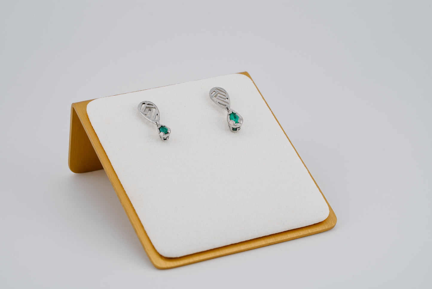 The Whisper of the Eagle Colombian Emerald Earrings in 0.10 ct Sterling Silver