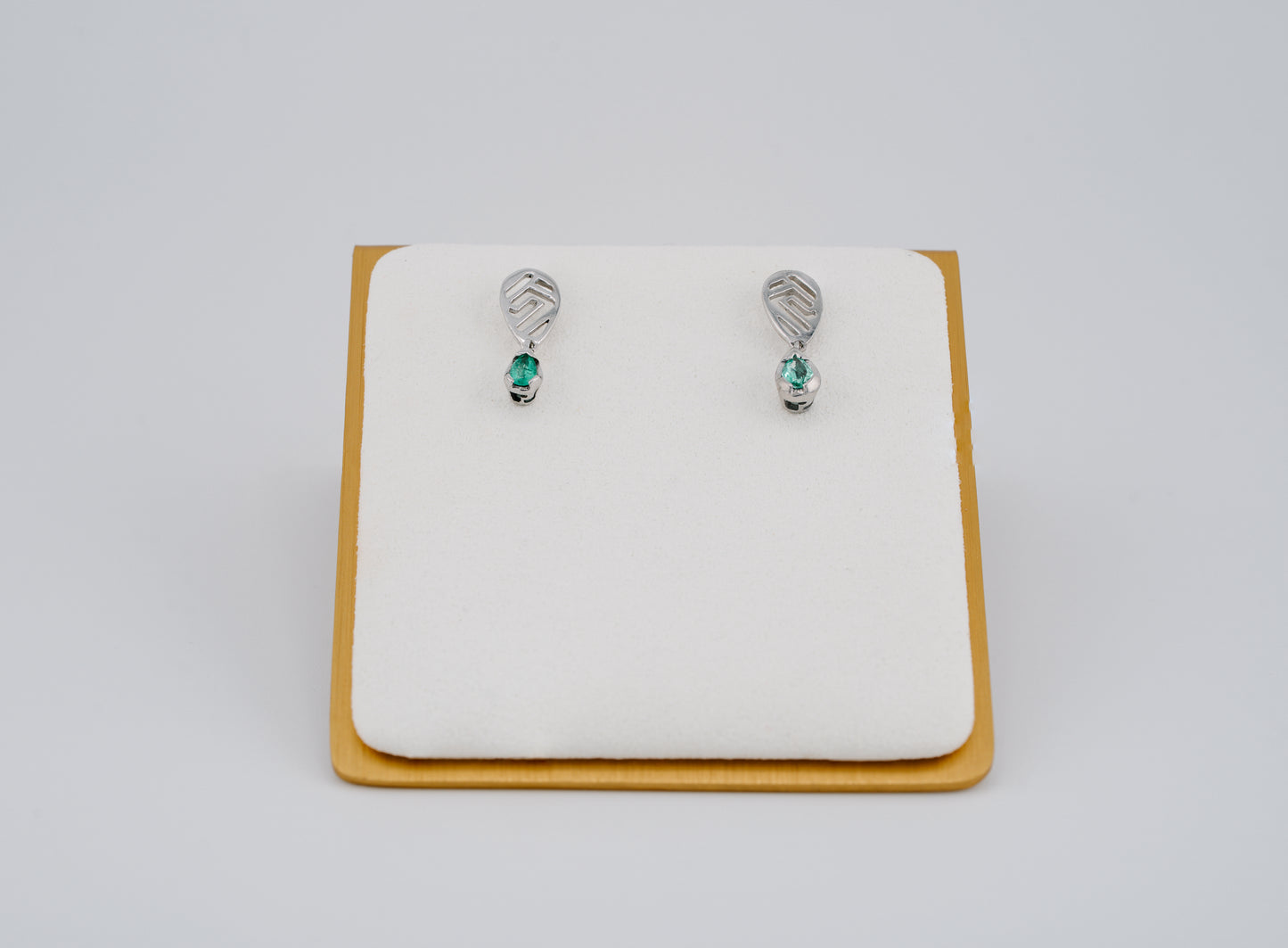 The Whisper of the Eagle Colombian Emerald Earrings in 0.53 ct Sterling Silver