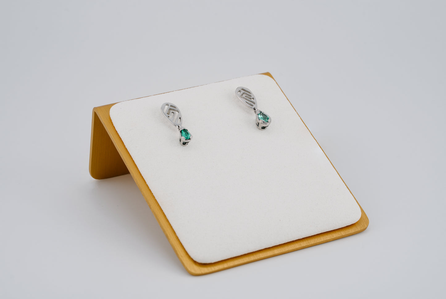 The Whisper of the Eagle Colombian Emerald Earrings in 0.53 ct Sterling Silver