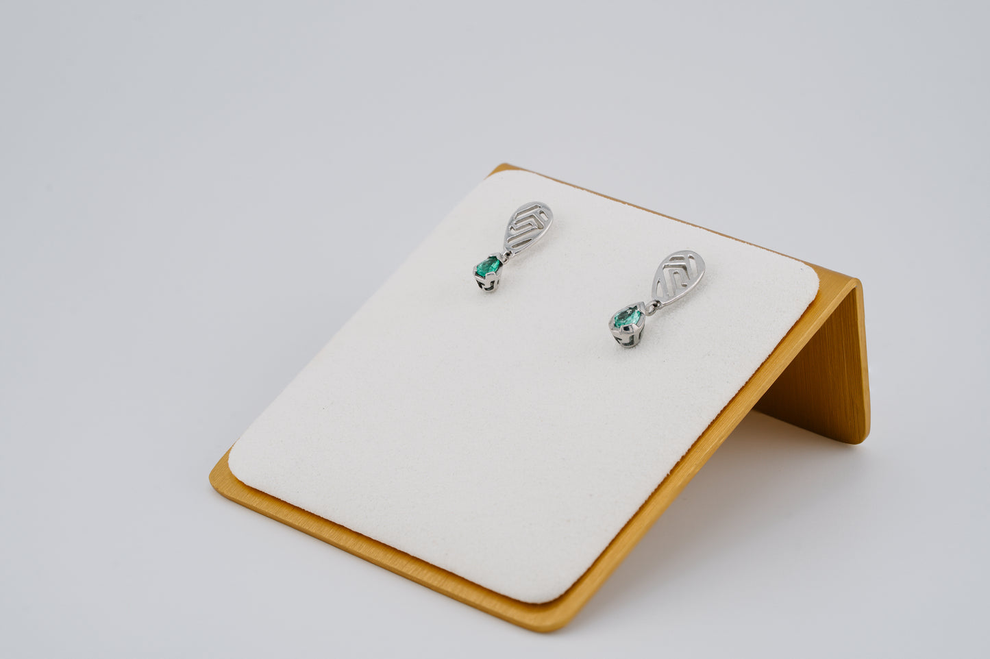 The Whisper of the Eagle Colombian Emerald Earrings in 0.53 ct Sterling Silver