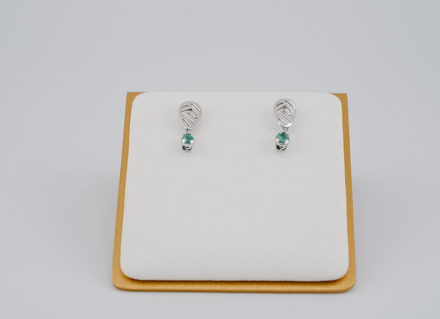 The Whisper of the Eagle Colombian Emerald Earrings in 0.20 ct Sterling Silver