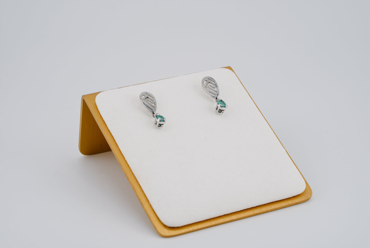 The Whisper of the Eagle Colombian Emerald Earrings in 0.20 ct Sterling Silver