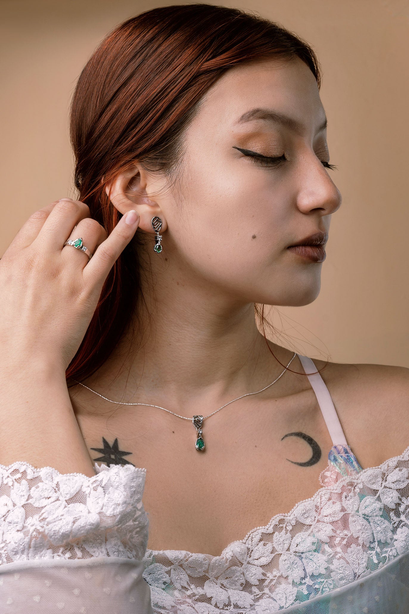 The Whisper of the Eagle Colombian Emerald Earrings in 0.42 ct Sterling Silver